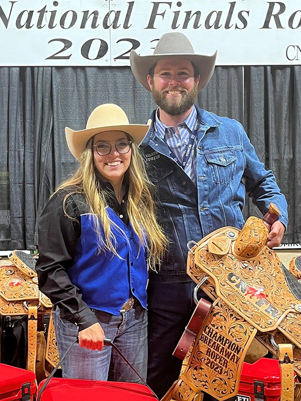 West Hills College Coalinga rodeo student Makayla Farkas wins in "breakaway Roping" at College National Finals Rodeo in Wyoming Makayla Farkas with Coach Justin Strickland